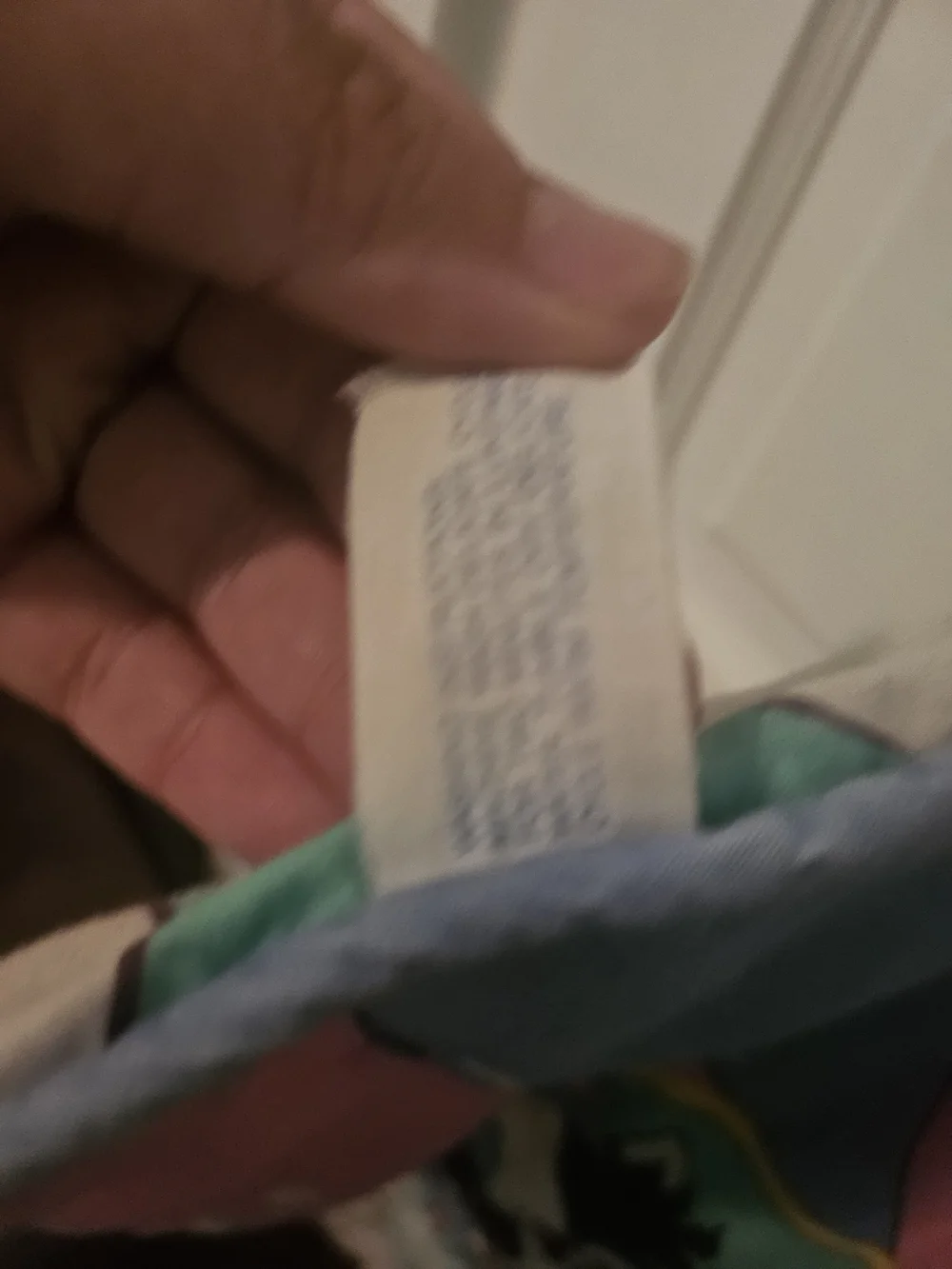 The item in the image is a vintage 1993 Baby Looney Tunes quilted crib blanket
